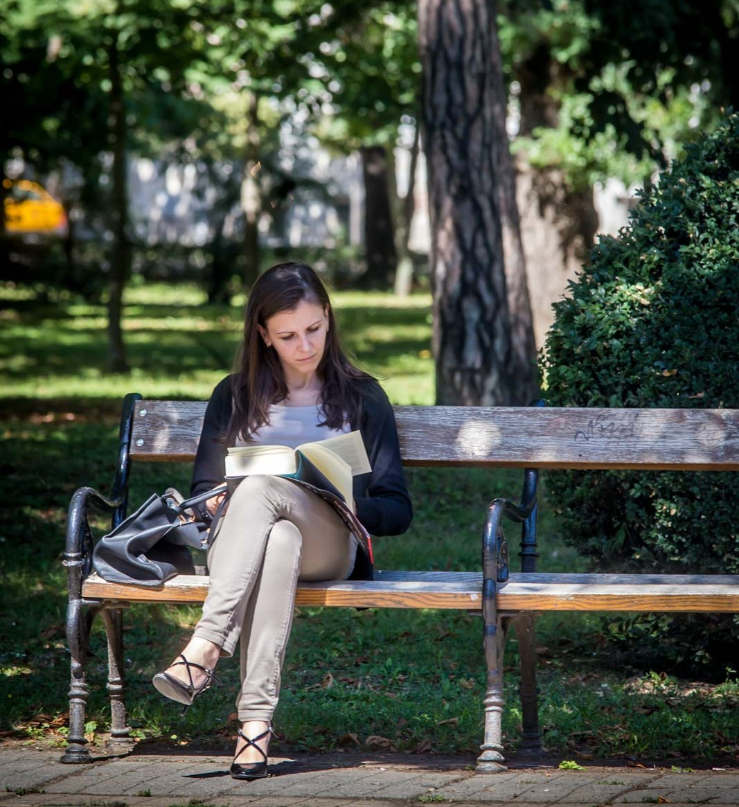 Woman reading in Timisoara